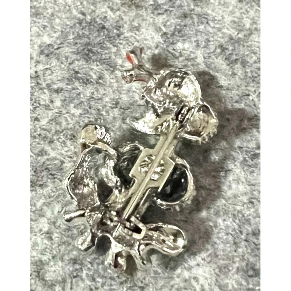 Vintage silver tone & red enamel poodle brooch